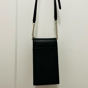 Phone crossbody
Rarely used
With adjustable strap